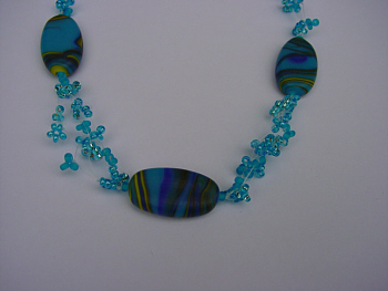 Perlenkette Rainbowstone.de